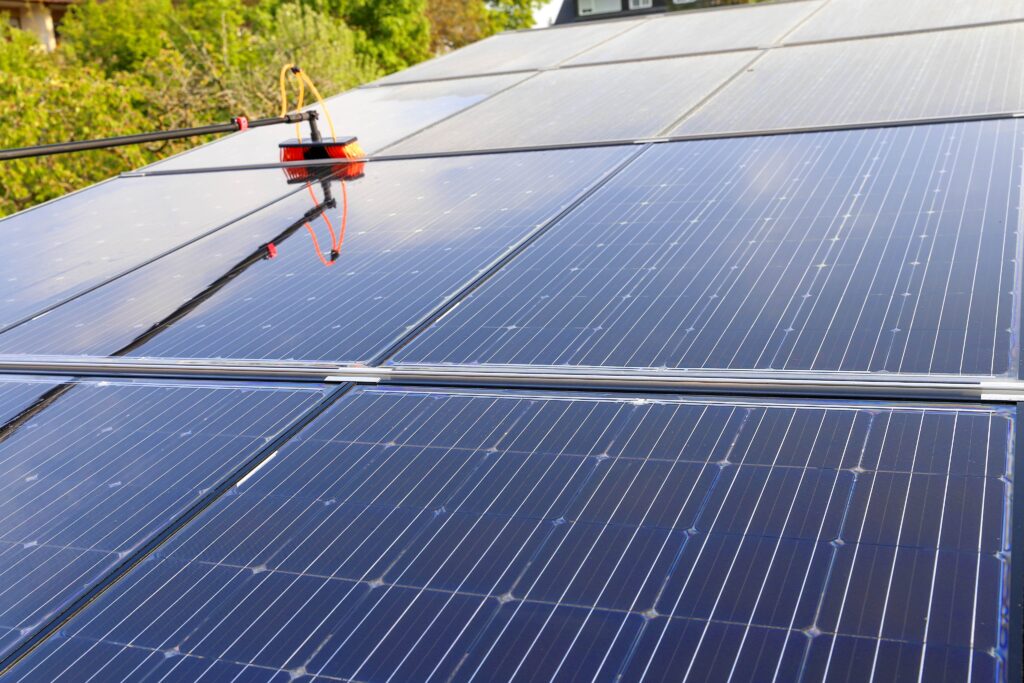 flash window cleaning, cleaning solar panels of one of their clients homes